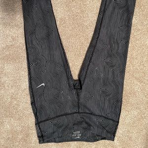 Black and gray nike capri leggings